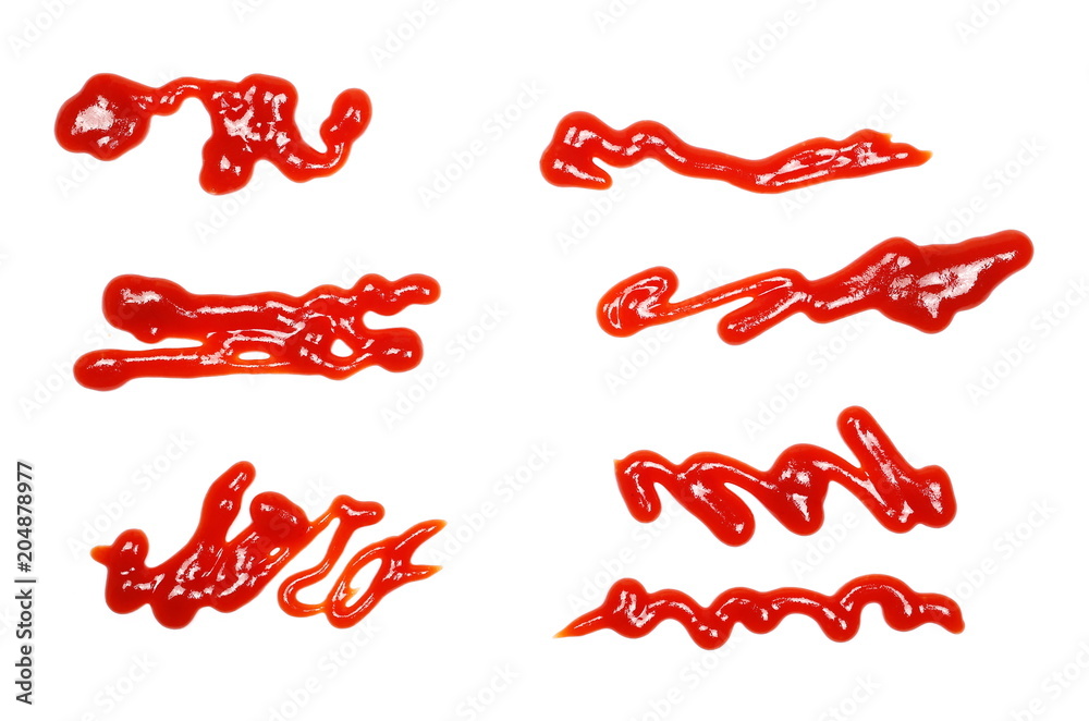 Red ketchup spreading, splashes isolated on white background, tomato pure texture, top view Red ketchup spreading, splashes isolated on white background, tomato pure texture, top view