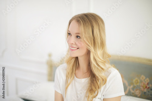 Blonde girl smiling