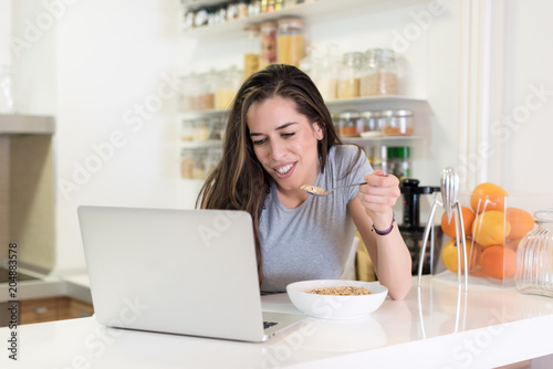 Woman Having Healthy Breakfast cereal