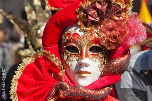 Red mask in a carnival parade