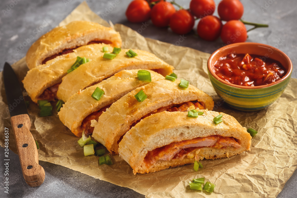 Ham and cheese stromboli, italian cuisine.