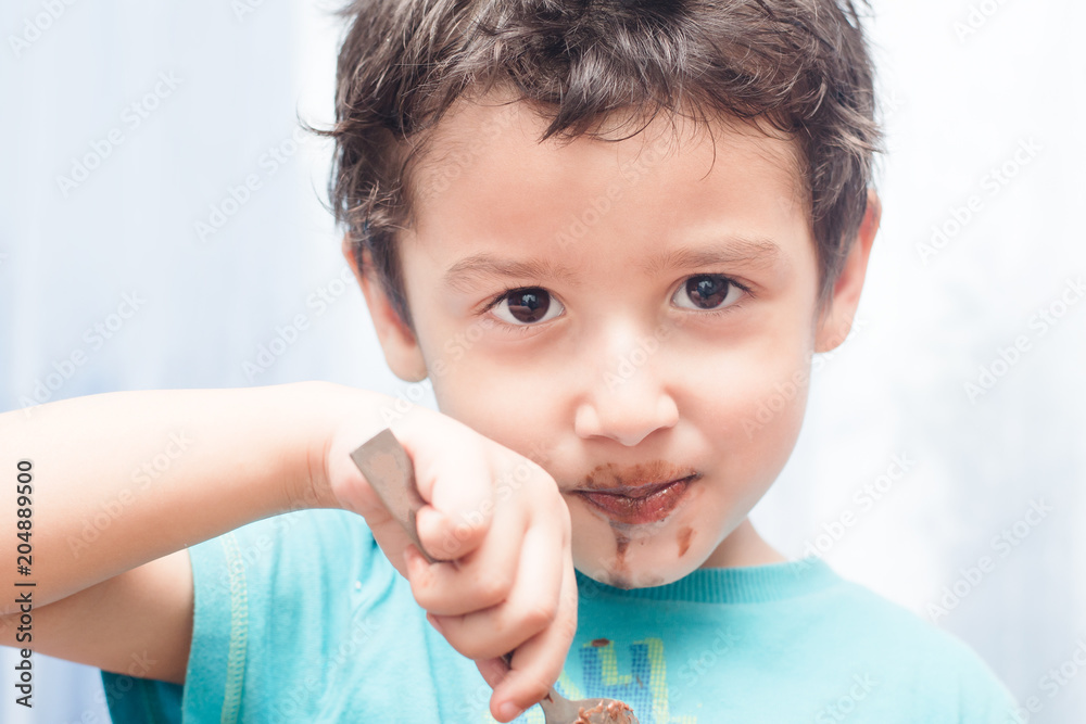 boy eating the sweetness boy eating the sweetness