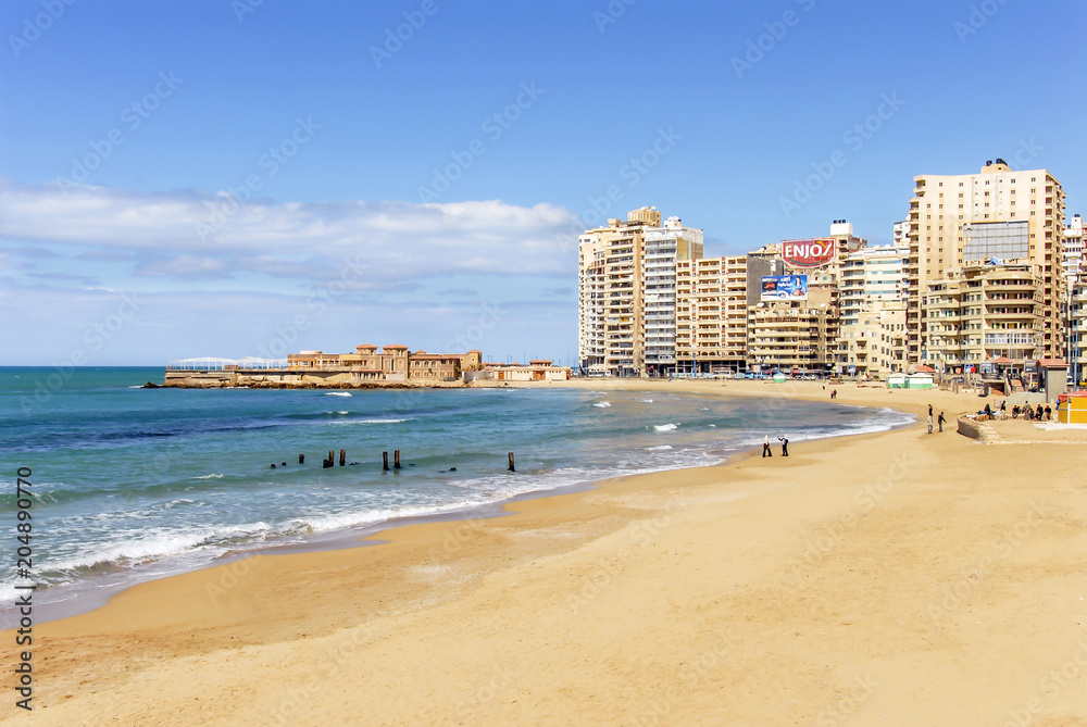 Alexandria, Egypt, 21 February 2018: Beach and buildings