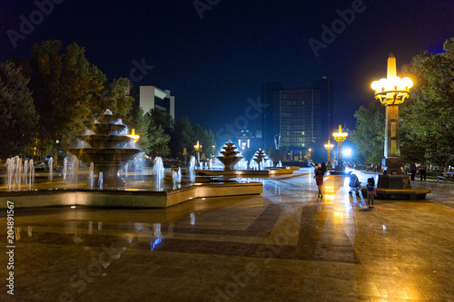 Night view of the Winter Boulevard. Fountains with night lights on the square. © ArtEvent ET