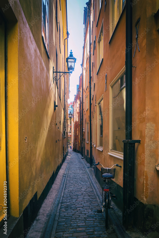 Fototapeta premium Narrow street in Old Town in Stockholm, Sweden