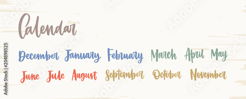 Bundle of colorful English names of months written with elegant calligraphic cursive font isolated on white background