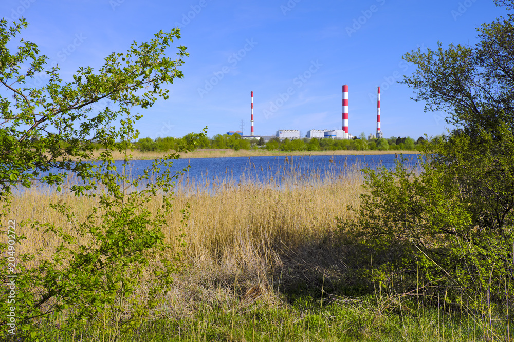 Warsaw, Poland - Siekierki Power and Heat Plant in Czerniakow quarter of Warsaw neighboring Czerniakowskie Lake nature reserve Warsaw, Poland - Siekierki Power and Heat Plant in Czerniakow quarter of Warsaw neighboring Czerniakowskie Lake nature reserve
