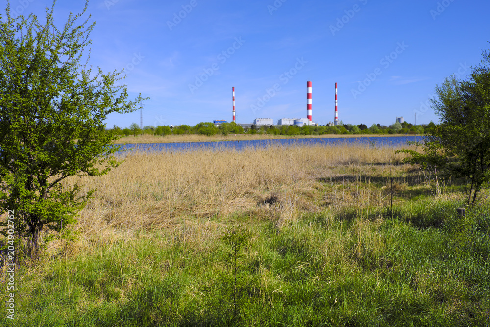 Warsaw, Poland - Siekierki Power and Heat Plant in Czerniakow quarter of Warsaw neighboring Czerniakowskie Lake nature reserve