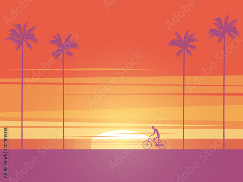 Biker riding bicycle at sunrise or sunset on the beach with palm trees in background. Symbol of active, healthy, sport lifestyle.