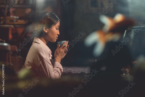 Young asian girl at a tea ceremony