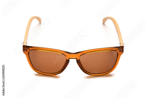 Stylish sunglasses with bamboo frame isolated on white background