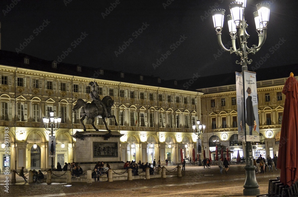 Naklejka premium Turin, Piedmont, Italy May 12 2018. Piazza San Carlo at night, one of the most beautiful squares in Turin.
