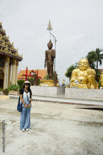 Thai women people visit and respect praying Katyayana or Gautama Buddha at Wat Sakae Krang photo