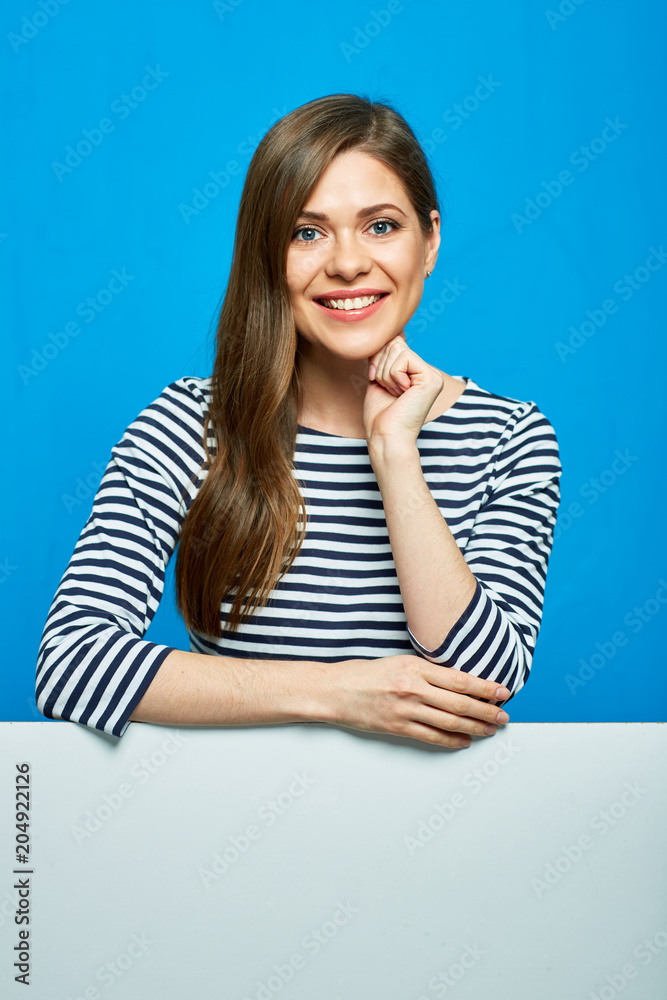 Smiling woman with white advertising copy space. Smiling woman with white advertising copy space.