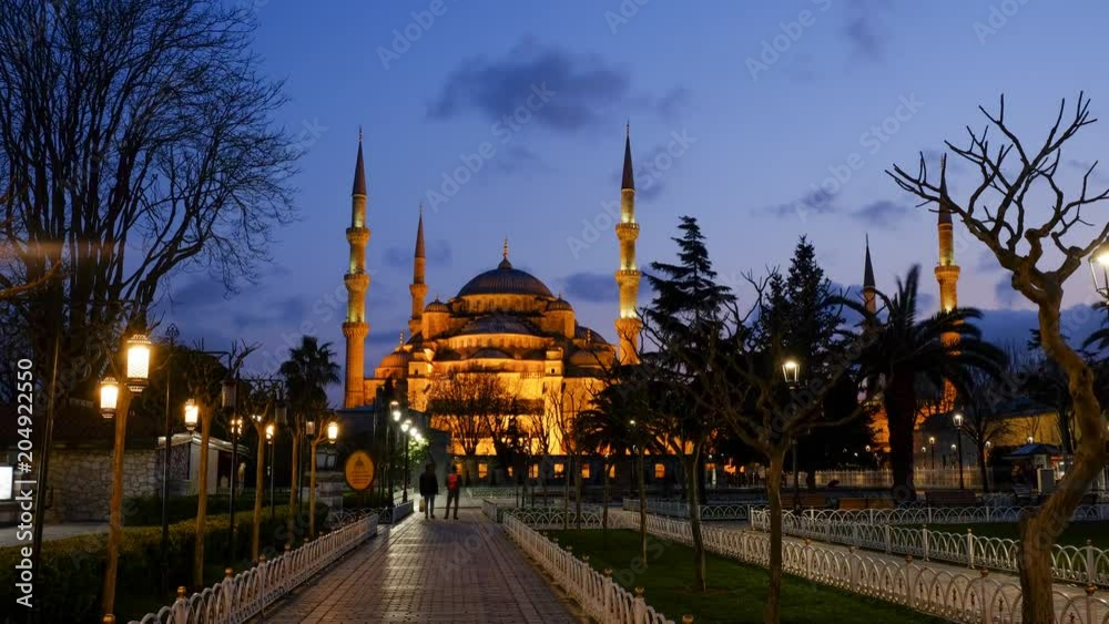 People walking near Blue mosque of Istanbul at evening time