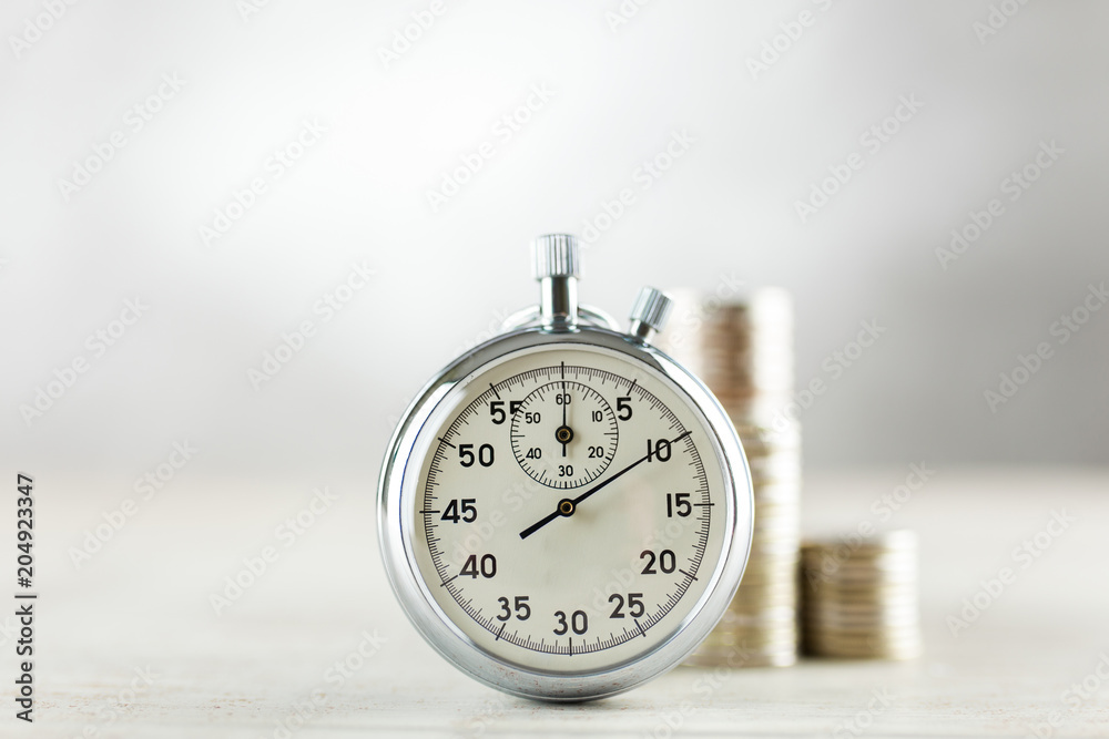Analog stopwatch on grey background Analog stopwatch on grey background