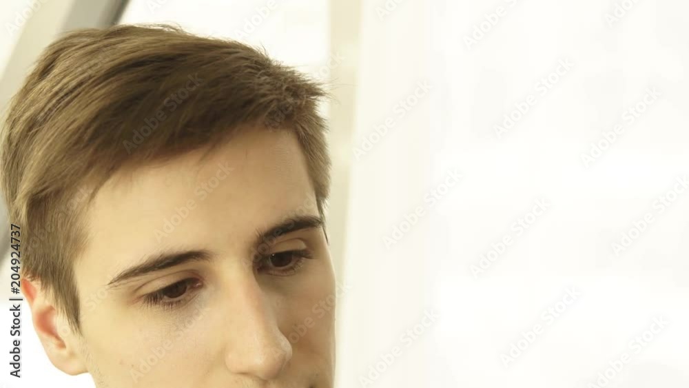 Hairdresser touching and looking hair before male haircutting in hairdressing salon. Close up haircutter working with client in barber salon. Hairdresser touching and looking hair before male haircutting in hairdressing salon. Close up haircutter working with client in barber salon.