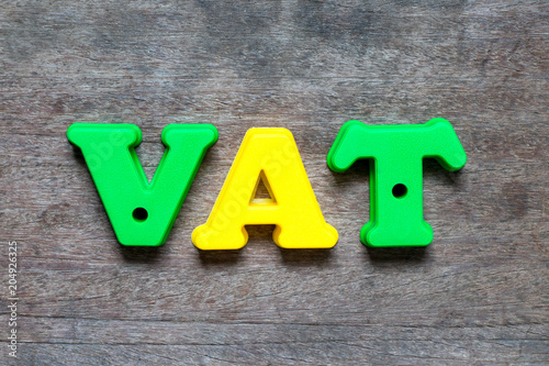 Wallpaper Mural Color alphabet in word VAT (value added tax) on wood background Torontodigital.ca