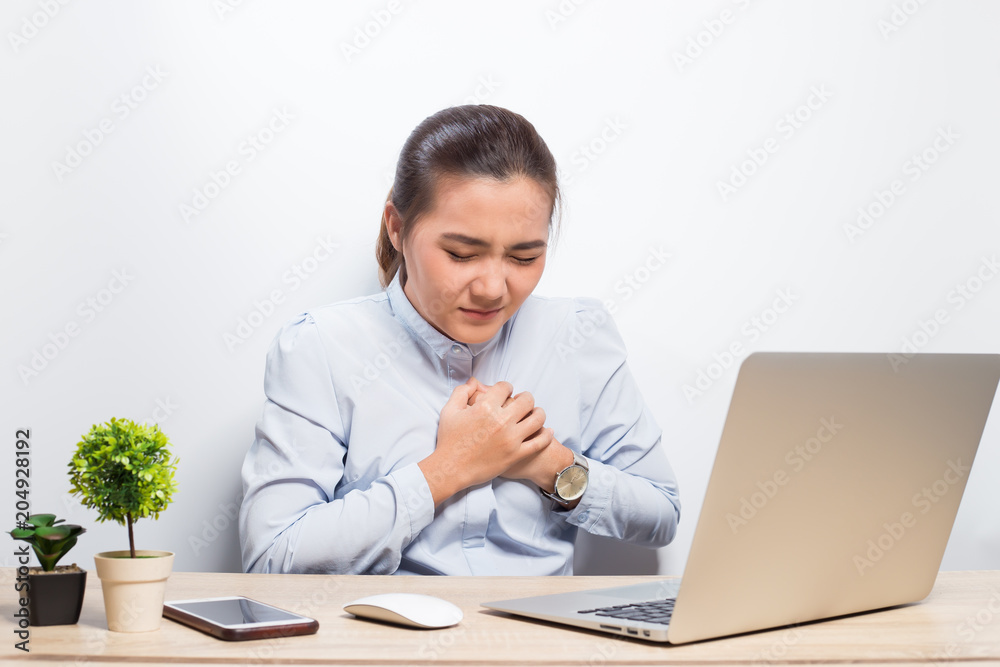 Woman has chest pain after hard work Woman has chest pain after hard work