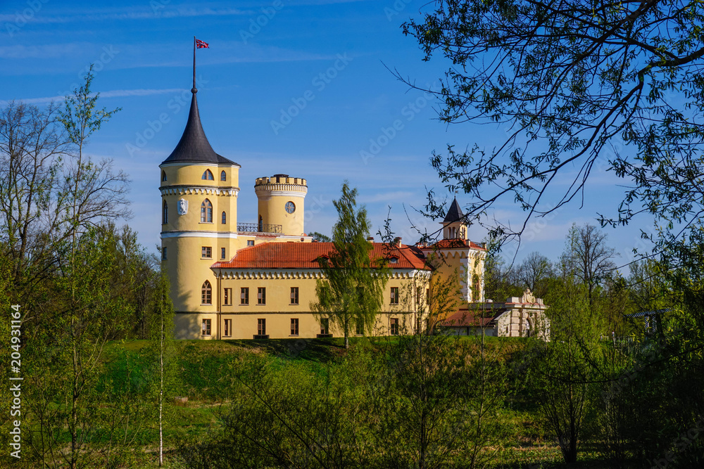 castle Bastion of Emperor Paul I in St. Petersburg on the background of spring greenery