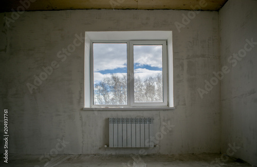 room without repair with window © Valeriy