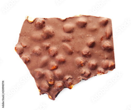 Delicious milk chocolate with nuts on white background