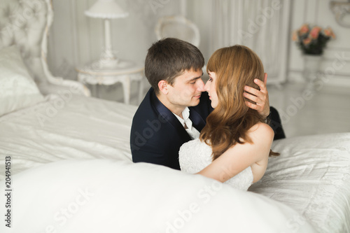 Sensual portrait of a young wedding couple. Outdoor © olegparylyak