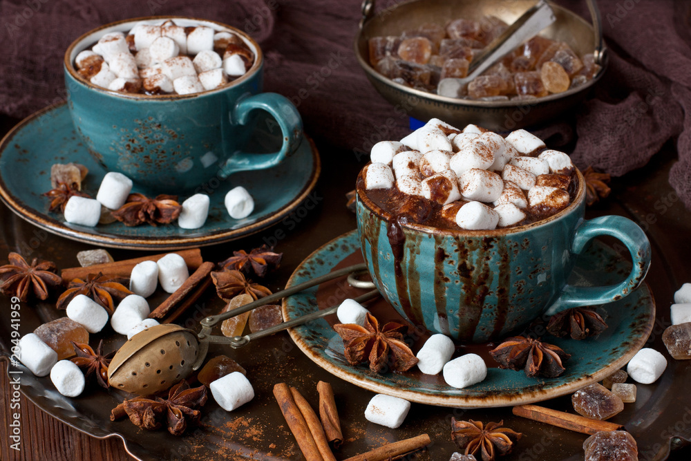 Hot cocoa with marshmallows on the wooden background. Christmas concept Hot cocoa with marshmallows on the wooden background. Christmas concept