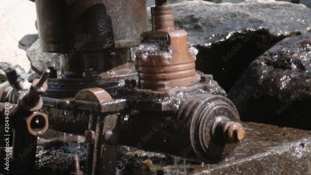 Large tubes of a water pumping system from an ancient installation. Slow motion Large tubes of a water pumping system from an ancient installation. Slow motion