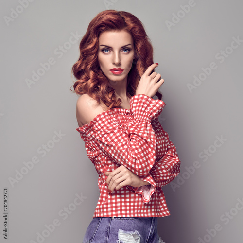 PinUp Portrait Beauty Redhead Girl.Curly hairstyle