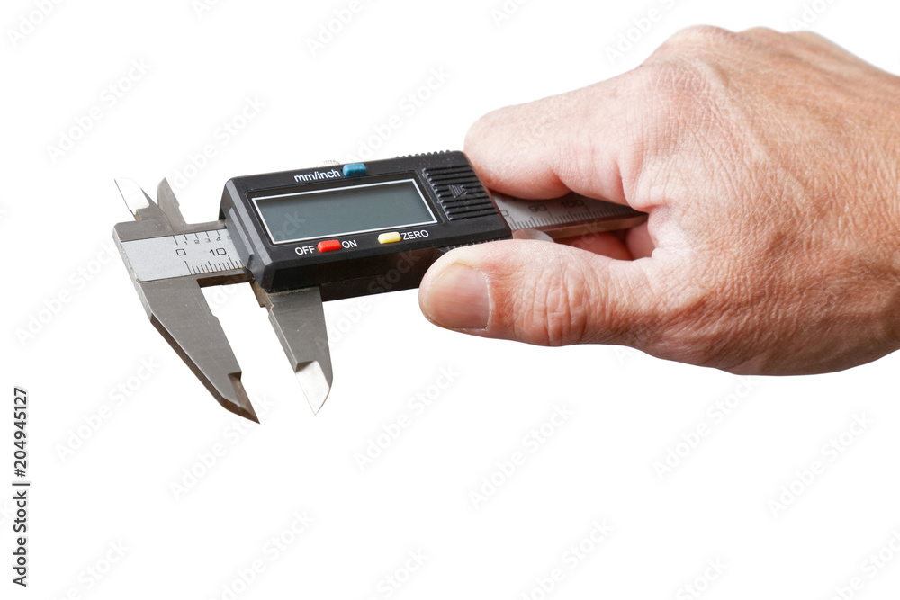 Closeup mans hand holds a electronic digital caliper isolated on white Closeup mans hand holds a electronic digital caliper isolated on white