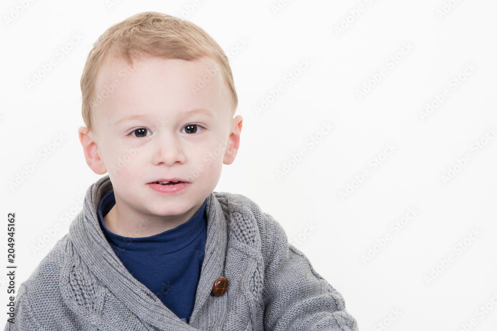 portrait child blond boy caucasian in white background portrait child blond boy caucasian in white background