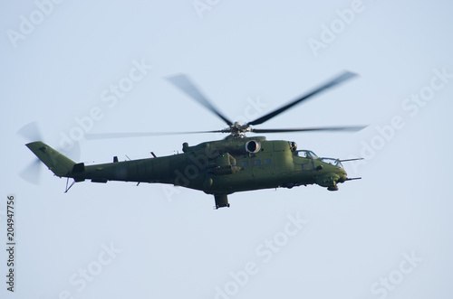 Canvas Print Mi24 helicopter on the sky