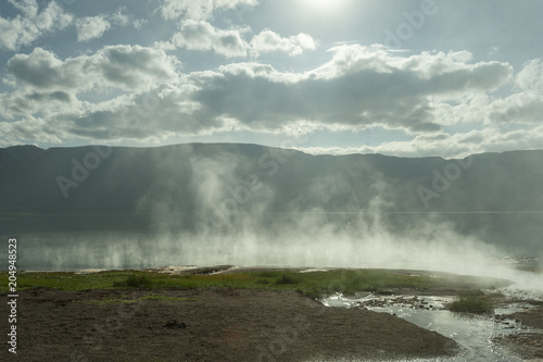 Morning at lake Bogoria with steam on the water from thermal springs