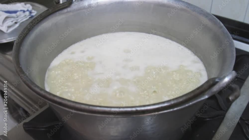 Close up, boiling rice in pot Close up, boiling rice in pot