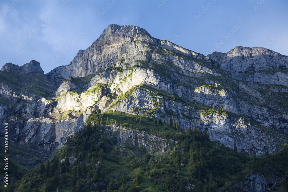 Morning in the mountains. Mountain peaks . Swiss Alps. Switzerland.