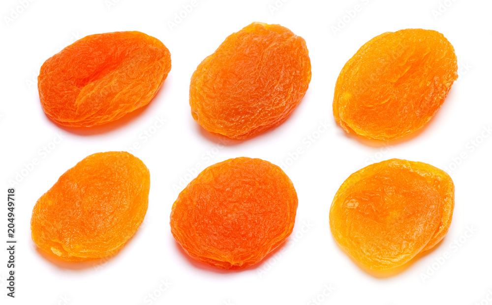 Set of Dried apricots close-up isolated on a white Set of Dried apricots close-up isolated on a white