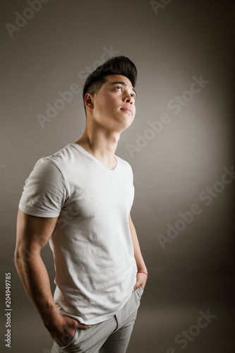 Young male posing in stylish casuals photo