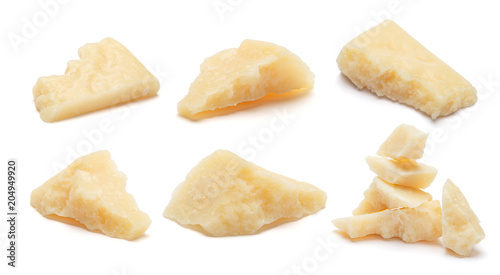Set of Parmesan cheese pieces on white