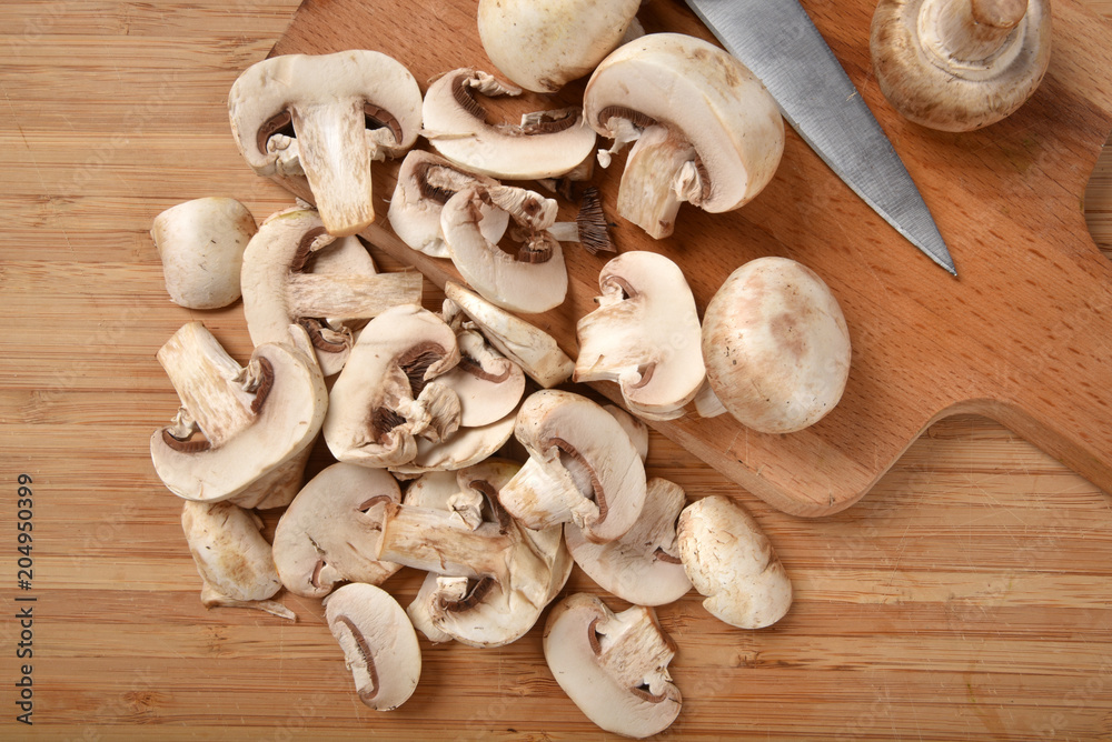 Sliced mushrooms overhead view Sliced mushrooms overhead view