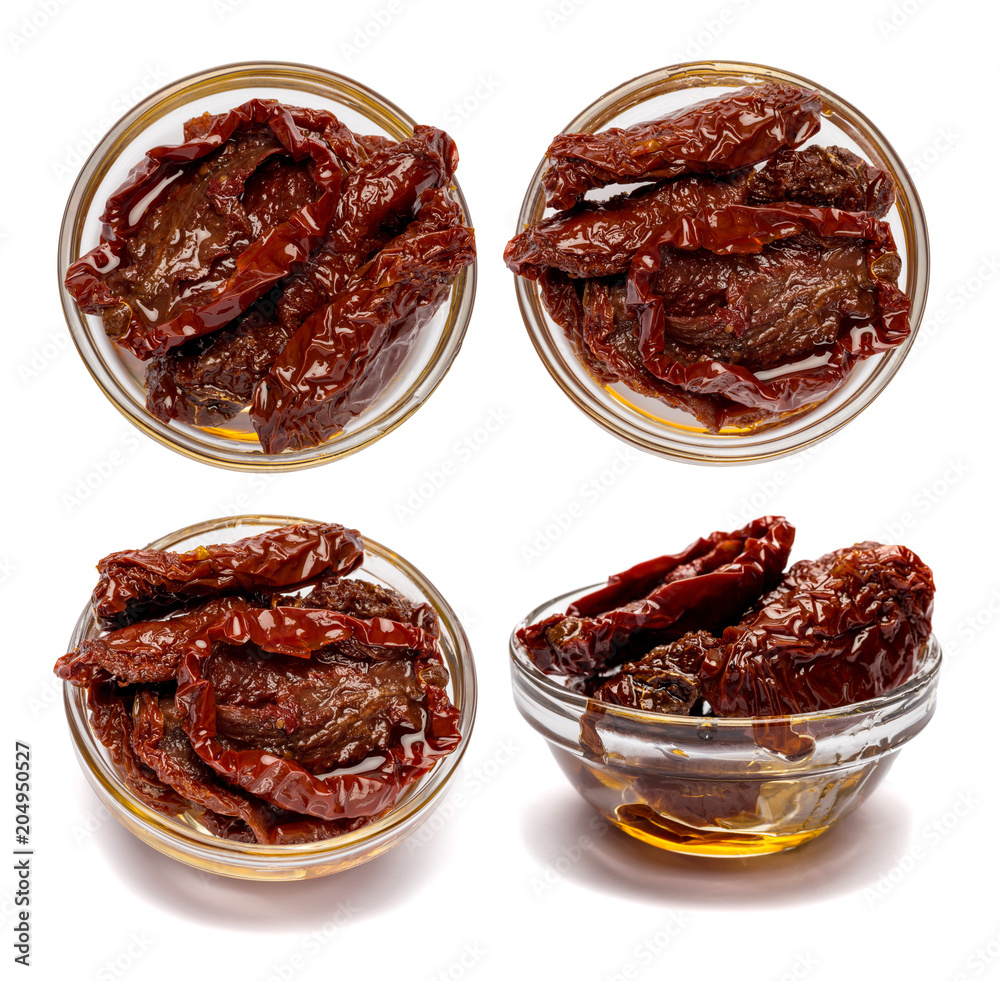 Set of Canned Sundried or dried tomato halves in glass bowl Set of Canned Sundried or dried tomato halves in glass bowl