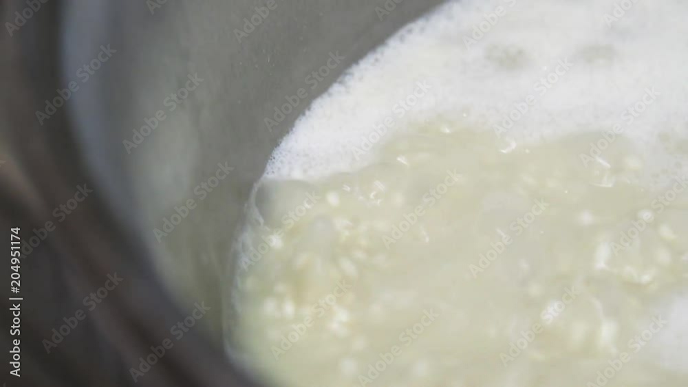 Close up, boiling liquid in pot Close up, boiling liquid in pot