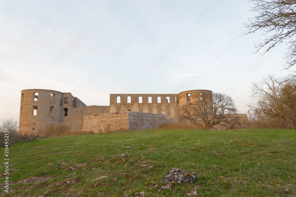 Ruin of the Borgholm castle in evening light, built around year 1100 used for defence of the Baltic sea. Ruin of the Borgholm castle in evening light, built around year 1100 used for defence of the Baltic sea.