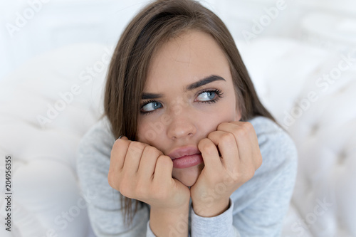 Portrait of a beautiful thoughtful woman.