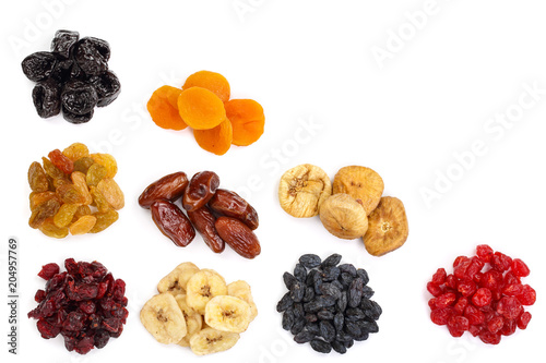Set of dried fruits isolated on white background with copy space for your text. Top view. Flat lay