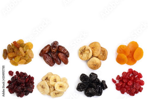 Set of dried fruits isolated on white background with copy space for your text. Top view. Flat lay