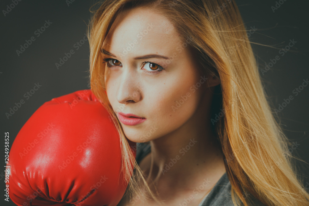 Beautiful woman with red boxing gloves Beautiful woman with red boxing gloves