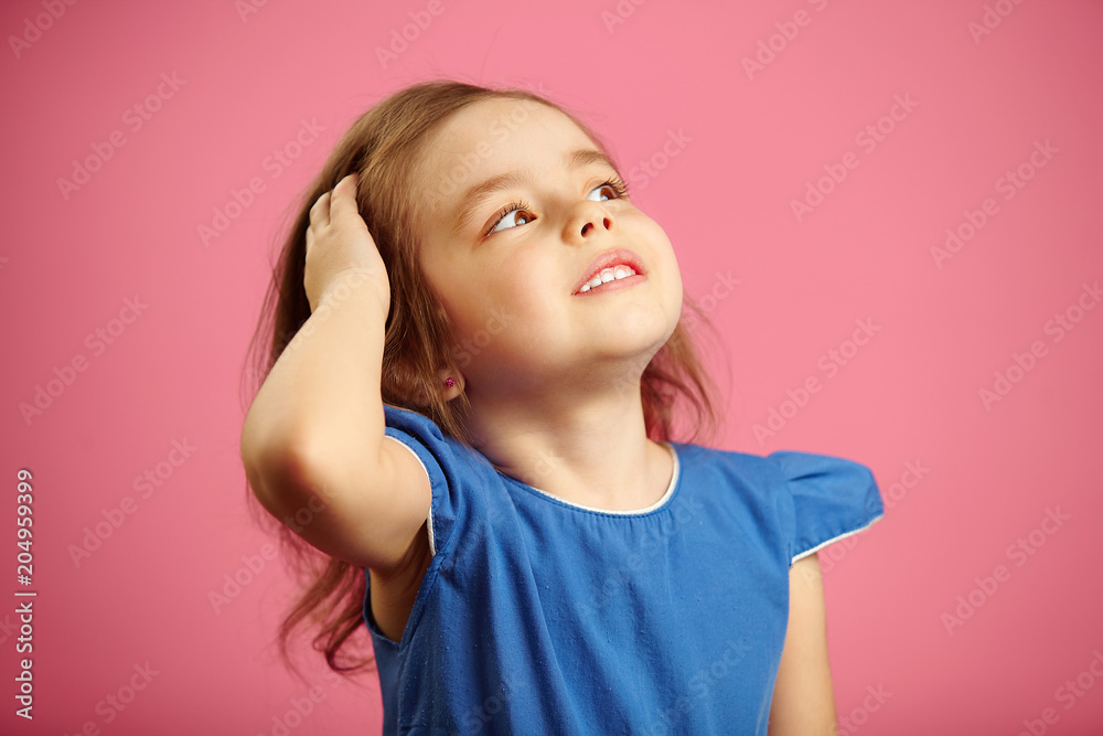 Little girl effectively straightens hair Little girl effectively straightens hair