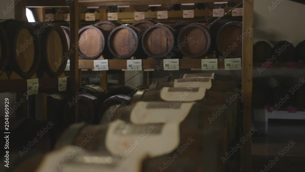 Pan left, barrels of alcohol Pan left, barrels of alcohol