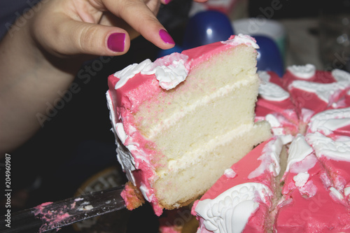 Woman holding delicious creamy cake
